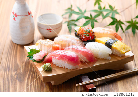 Assorted nigiri sushi served on sushi sandals 118801212