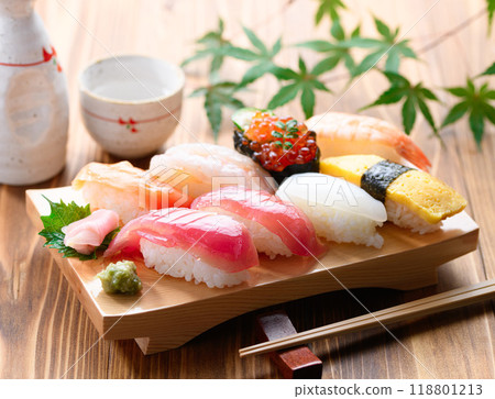 Assorted nigiri sushi served on sushi sandals Assorted nigiri sushi served on sushi sandals 118801213