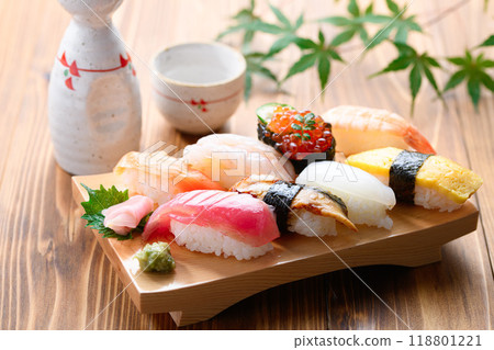 Assorted nigiri sushi served on sushi sandals Assorted nigiri sushi served on sushi sandals 118801221