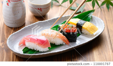Sushi and sake served on a plate 118801787
