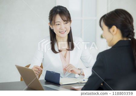 Woman working in the office 118803359