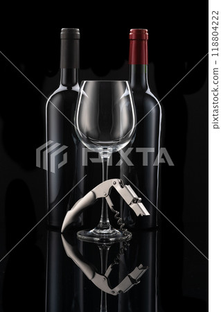 Two wine bottles next to each other, a wine glass and wine cutlery in front of a black background 118804222