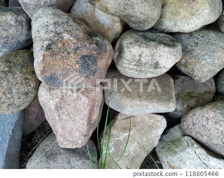 A man made stone wall, stacked stones, big stones creating pattern and texture 118805466
