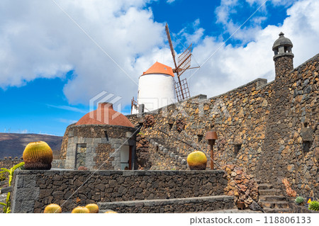Picture of the windmill with walls and footpath in the cactus garden Jardin de Cactus of Lanzarote 118806133