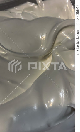 Smooth and Fluffy Whipped Cream Close-up. High quality photo 118806645