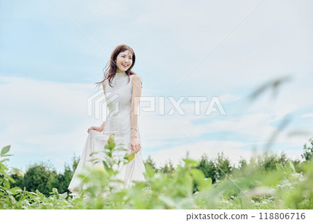 Portrait of a woman standing in nature Portrait of a woman standing in nature 118806716