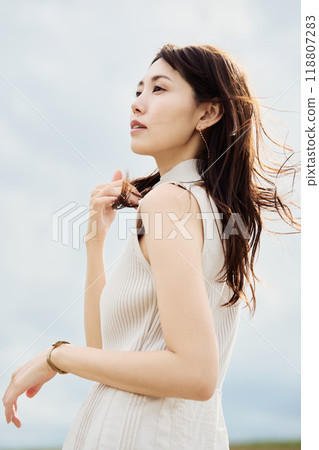 Portrait of a woman standing in nature Portrait of a woman standing in nature 118807283