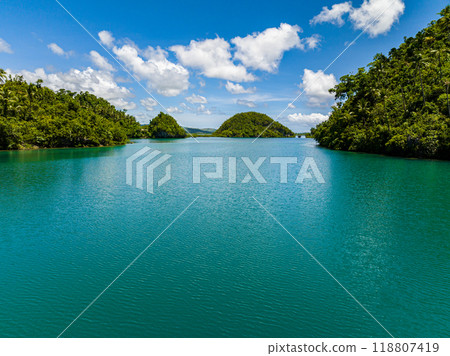 Beautiful lagoons in Tropical small island. Beach with turquoise water. Surigao del Norte, Mindanao, Philippines. Beautiful lagoons in Tropical small island. Beach with turquoise water. Surigao del Norte, Mindanao, Philippines. 118807419