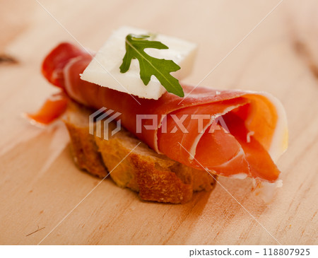 Perfect sandwich made with rye bread cheese and Parma ham Perfect sandwich made with rye bread cheese and Parma ham 118807925