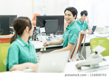 Care managers chatting in the office 118808743