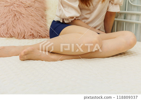 Beautiful legs of a woman wearing pantyhose Beautiful legs of a woman wearing pantyhose 118809337