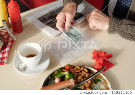 Man Preparing Payment for Restaurant Bill 118811160
