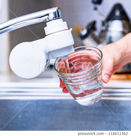 PFAS: Organofluorinated compounds can be removed with water purifiers [Image of water quality as a social problem] 118811362