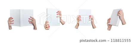 Book, hard cover mock up, hardback mockup. Hands, red nails holding paper literature, isolated on Book, hard cover mock up, hardback mockup. Hands, red nails holding paper literature, isolated on 118811555