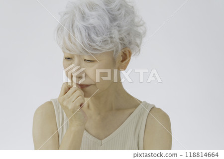 Depressed gray-haired senior woman 118814664