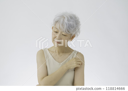 Depressed gray-haired senior woman 118814666