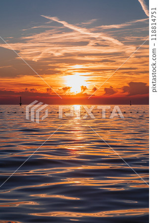 An incredibly beautiful sunset on the beach of the hotel 118814751