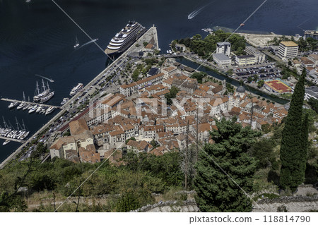 Montenegro, Kotor. Old town of Kotor with cruise ship Evrima in the harbor. 118814790