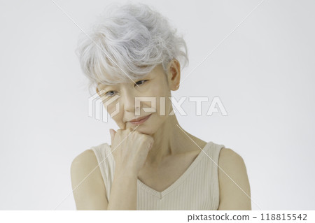 Thinking gray-haired senior woman 118815542
