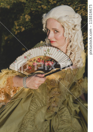 Portrait of blonde woman dressed in historical Baroque clothes with old fashion hairstyle 118816675