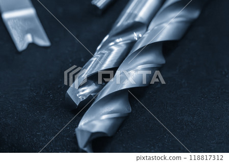 Close-up scene new drill tools in the light blue scene. Close-up scene new drill tools in the light blue scene. 118817312