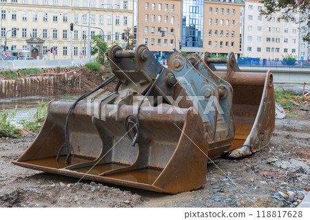 Excavator buckets on the bank of the river Svratka, Brno, Czech republic, floods after storm Boris, September 15, 2024. 118817628