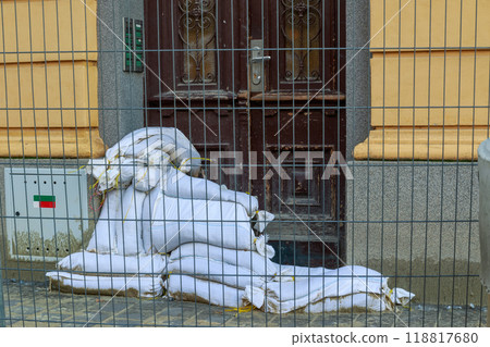 Sand bags in front of the  door in the house on riverbank of  Svratka, Brno, Czech republic, floods after storm Boris, September 15, 2024. 118817680