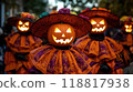 carved jack o lanterns with glowing faces. Spooky Halloween Pumpkins and Candles 118817938