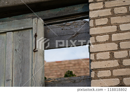 The doors of the back entrance to an abandoned, rustic store The doors of the back entrance to an abandoned, rustic store 118818802