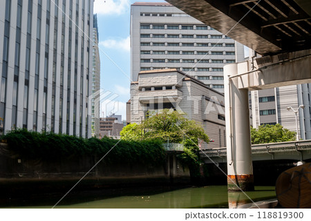 Tokyo Stock Exchange and skyscrapers as seen from Nihonbashi River Tokyo Stock Exchange and skyscrapers as seen from Nihonbashi River 118819300