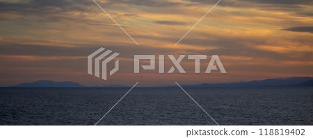 Colorful sunset over spanish coastline. Seascape with sun rays in the evening. Colorful sunset over spanish coastline. Seascape with sun rays in the evening. 118819402