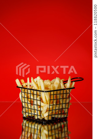 French fries on a red background French fries on a red background 118820500