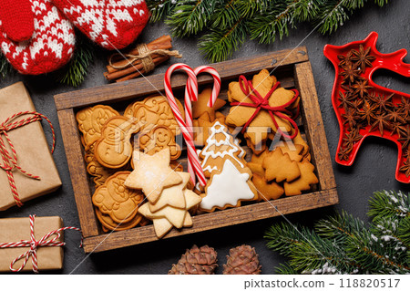 Gingerbread cookies and fir tree branch Gingerbread cookies and fir tree branch 118820517
