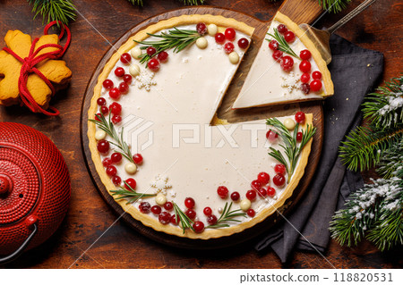 Christmas cake adorned with berries and rosemary Christmas cake adorned with berries and rosemary 118820531