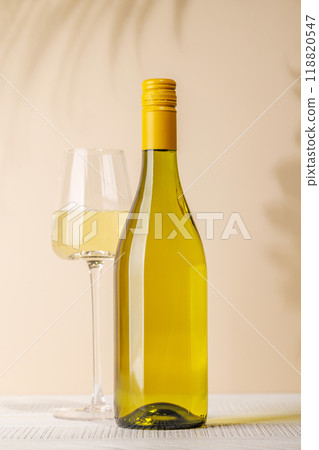 White wine bottle and wine glass White wine bottle and wine glass 118820547