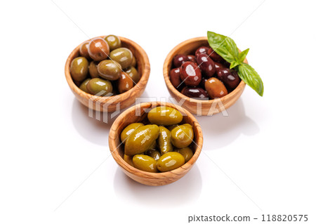 An assortment of various olives presented in a bowl, showcasing different colors, textures, and flavors An assortment of various olives presented in a bowl, showcasing different colors, textures, and flavors 118820575