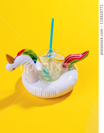 A vibrant summer vacation scene with floating flamingo and cocktail A vibrant summer vacation scene with floating flamingo and cocktail 118820771