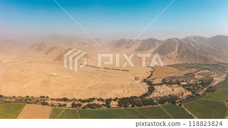 Ultra wide view the ancient archaeological site of Caral, near Supe, Barranca Province, Peru. Caral is a UNESCO world heritage site and considered to be the oldest city in the Americas. 118823824