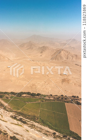 Aerial view the ancient archaeological site of Caral, near Supe, Barranca Province, Peru. Caral is a UNESCO world heritage site and considered to be the oldest city in the Americas. 118823869