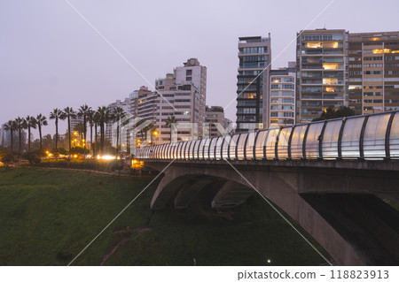 Bridge over a river with a Lima city in the background. Miraflores, Lima Peru. Bridge over a river with a Lima city in the background. Miraflores, Lima Peru. 118823913
