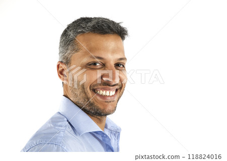 A man with a beard and a smile is wearing a blue shirt 118824016