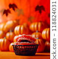 Celebrating Halloween in Dentistry. Teeth, Denture in Black Basket on Yellow Table. Yellow Orange Pumpkin on Background, Vertical, Copy Space. Horizontal Space. Dental Clinic 118824031