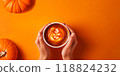 Top View Female Hands Hold Cup with Pumpkin Coffee, Spice Latte, Cappuccino. Hot Drink, Beverage in Autumn. Pumpkins on Yellow Background. Copy Space 118824232