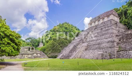 The ancient pyramids of Palenque in Mexico, surrounded by lush jungle. Iconic archaeological site showcasing Mayan culture and history. Travel, history, and adventure concept The ancient pyramids of Palenque in Mexico, surrounded by lush jungle. Iconic archaeological site showcasing Mayan culture and history. Travel, history, and adventure concept 118824312