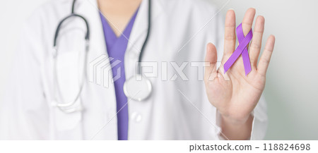 Doctor holding purple Ribbon for Violence, Pancreatic, Esophageal, Testicular cancer, Alzheimer, epilepsy, lupus, Sarcoidosis and Fibromyalgia. Awareness month and World cancer day concept Doctor holding purple Ribbon for Violence, Pancreatic, Esophageal, Testicular cancer, Alzheimer, epilepsy, lupus, Sarcoidosis and Fibromyalgia. Awareness month and World cancer day concept 118824698