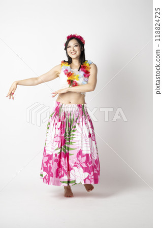A female hula dancer smiling and spreading her arms on a white background A female hula dancer smiling and spreading her arms on a white background 118824725