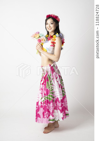 A female hula dancer smiling and spreading her arms on a white background A female hula dancer smiling and spreading her arms on a white background 118824728