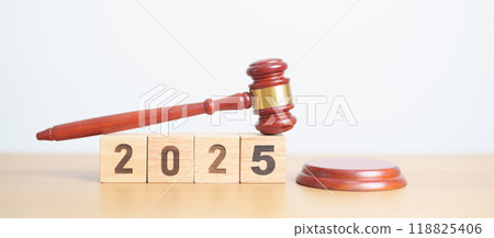 Happy New Year 2025 with judge gavel on table. Law, lawyer, judgment, justice auction and bidding concept 118825406