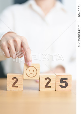 Happy New Year 2025 with Sad face block. Satisfaction, feedback, Review, mental health, eco sustainable and bad year concept 118825550