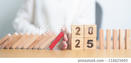 2025 year with falling blocks on table, Risk Management, recession, business financial, Resolution, strategy, goal, New Year planning and inflation deflation and economic recession concepts 2025 year with falling blocks on table, Risk Management, recession, business financial, Resolution, strategy, goal, New Year planning and inflation deflation and economic recession concepts 118825605
